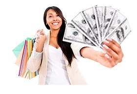 Happy shopping woman with a lot of money - isolated over white_email.jpg